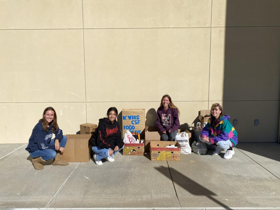 KVHS students prepare for the annual CSF Thanksgiving food drive. Left to right: Molly Watson (12), Angela Lezama (12), Brooke Watson (12), and Nikki Brooks (12).